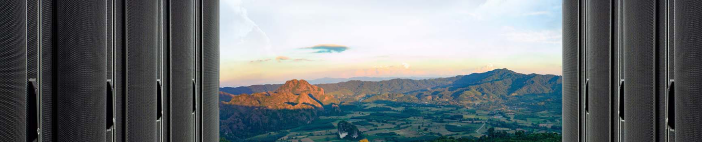 Server Computer Rack in Data Center isolated on mountain background.