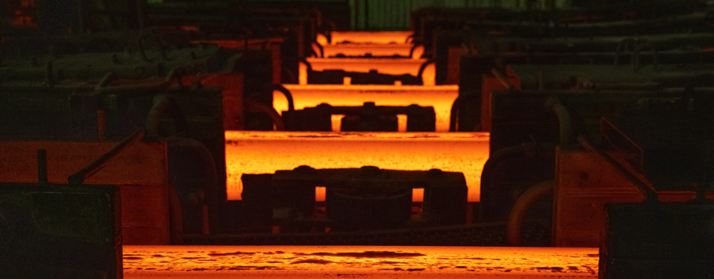Lengths of red hot steel in a factory. Photographer: Andrey Rudakov/Bloomberg