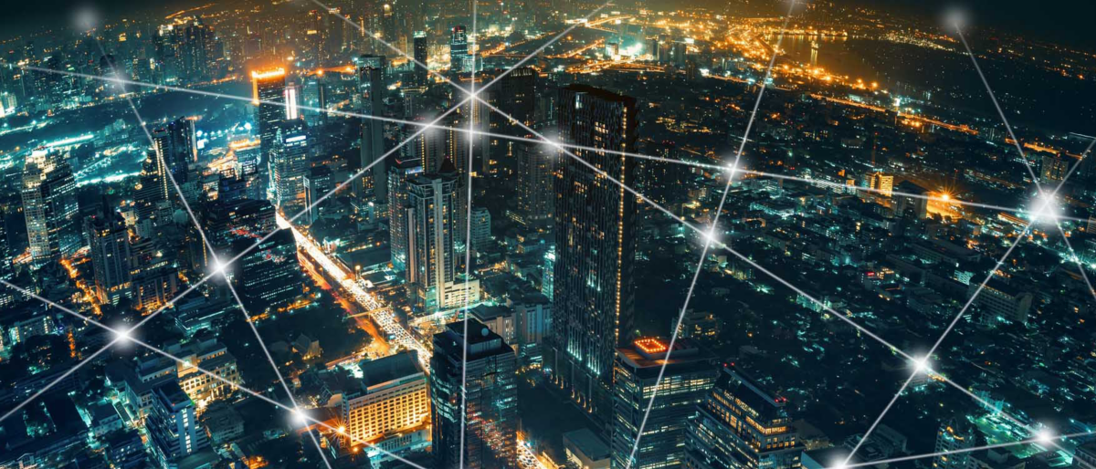Network and Connection technology night city background at business center bangkok thailand. Wireless skyline connection with energy light infographic.