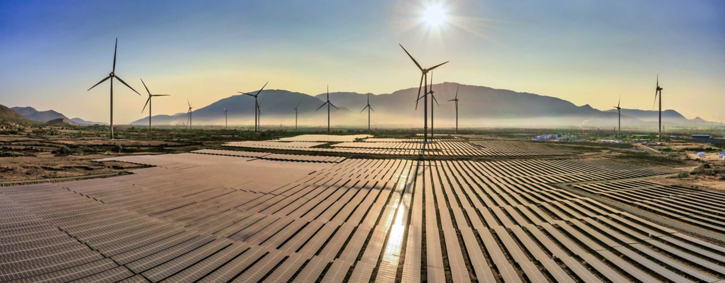 Aerial view of windmill and Solar panel, photovoltaic, alternative electricity source - concept of sustainable resources on a sunny day, Bac Phong, Thuan Bac, Ninh Thuan, Vietnam