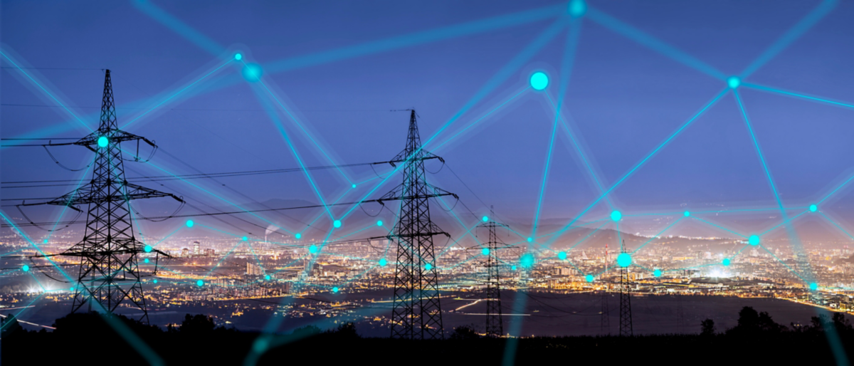 High power electricity poles in urban area connected to smart grid. Energy supply, distribution of energy, transmitting energy, energy transmission, high voltage supply concept photo. 