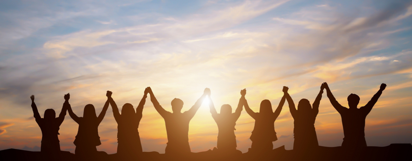 Silhouette of group happy business team making high hands over head in beautiful sunset sky evening time for business success and teamwork concept in company 